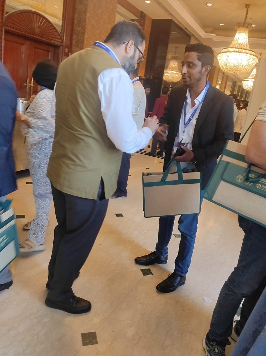 Delegates talking at the conference venue