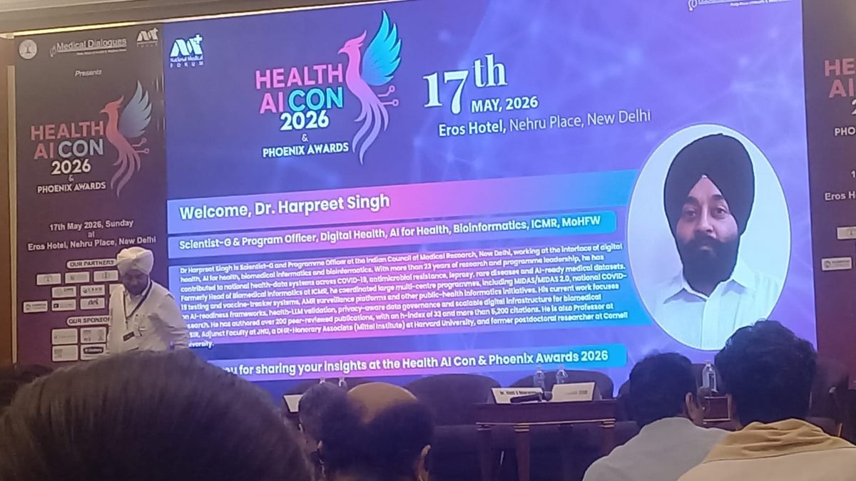 The Health AI CON 2026 stage and screens during a session