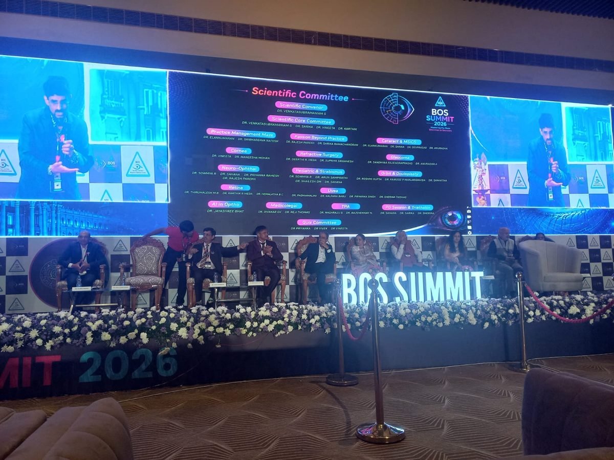 The main auditorium at BOS Summit 2026, stage and screens mid-session