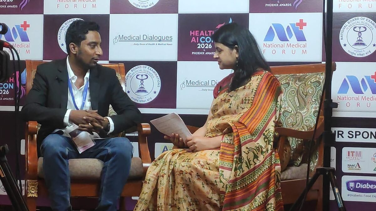 Athreya MedTech being interviewed on stage at Health AI CON 2026, with the conference backdrop behind