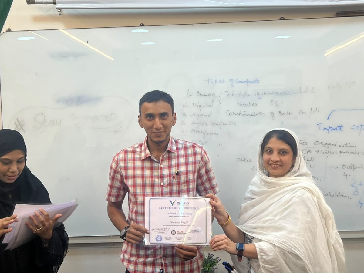 A participant receiving a certificate of completion at the HIPAA training