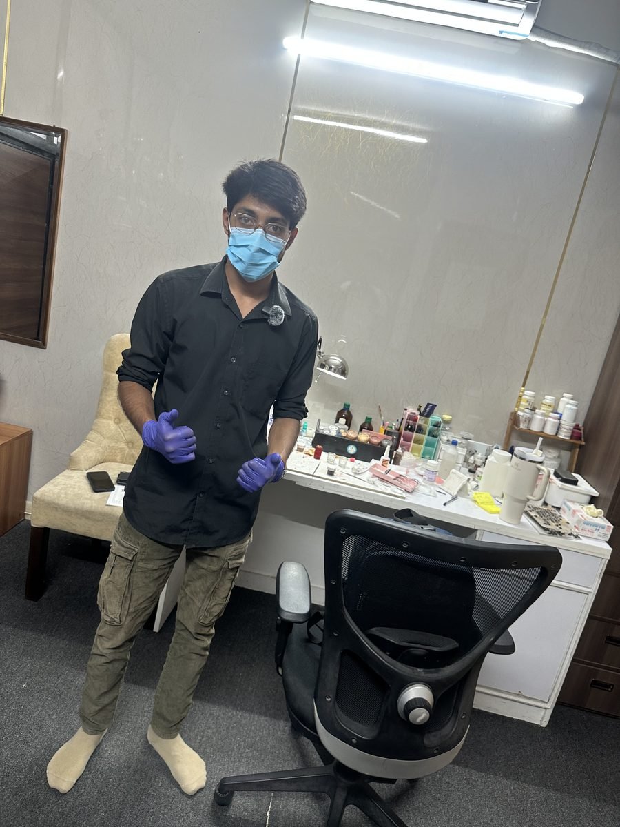 Researcher in the phantom laboratory with materials laid out on the bench