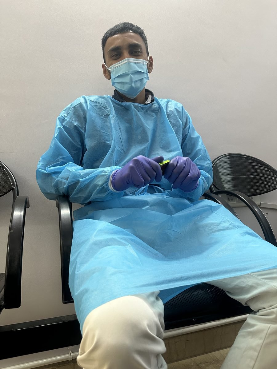 Ocularist preparing a prosthesis at the chair