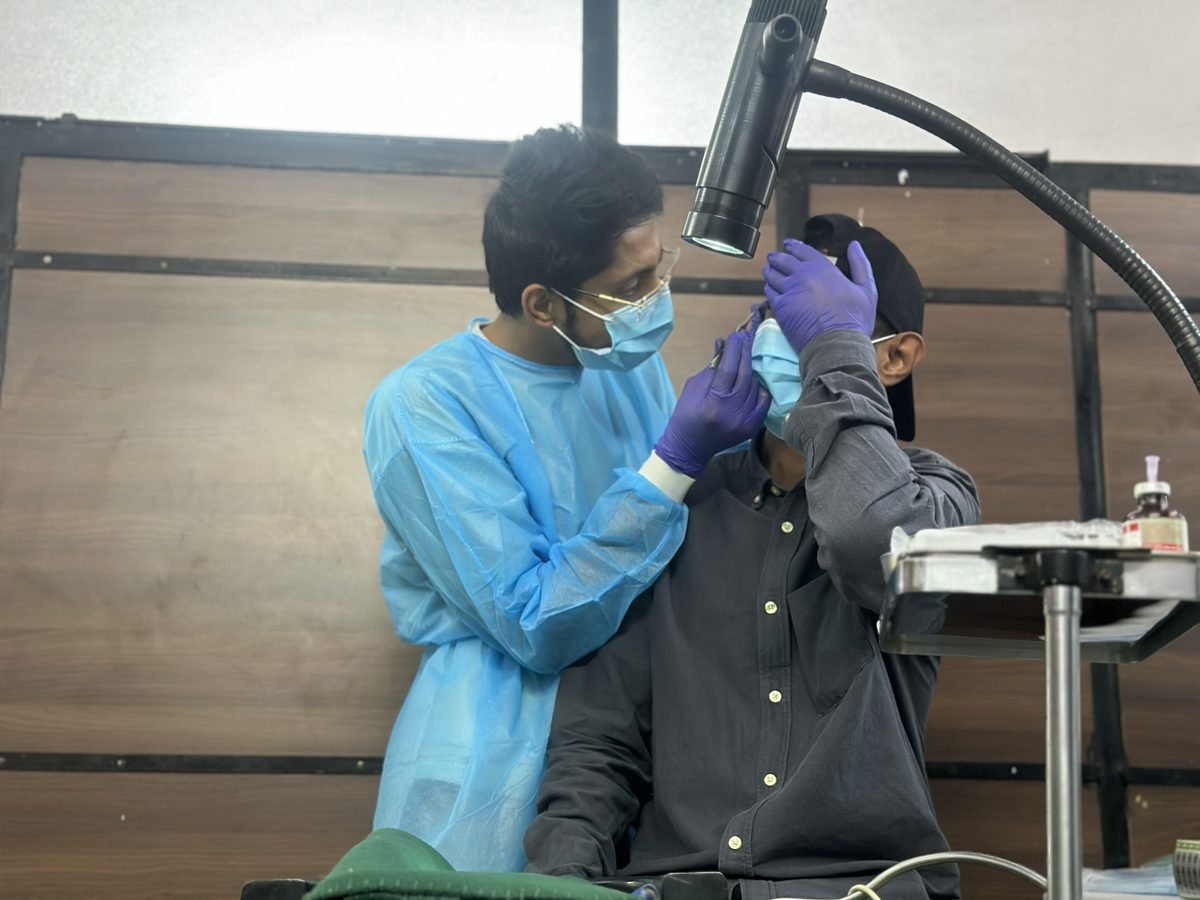 Clinician and patient during a prosthetics consultation